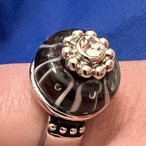 Zebra  bead ring  with thick silver tone band.